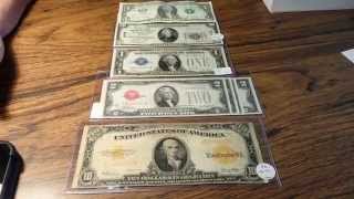 What are the colored seals on US paper money?