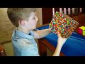 kid solves rubiks cube in 1.4 seconds..