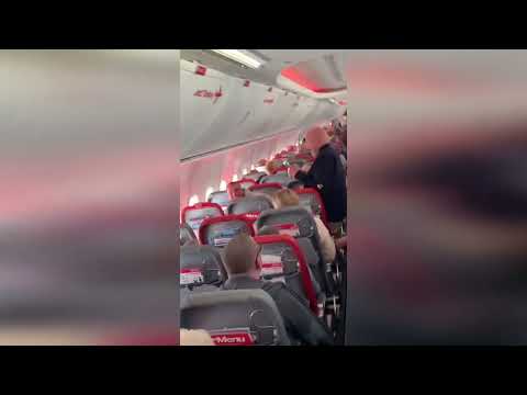 Moment cabin crew make hilarious special announcement - for man that has just been dumped