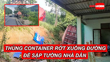Thùng container rớt xuống đường, đè sập tường nhà dân | Báo Người Lao Động