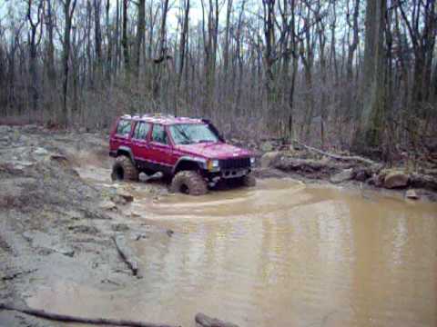 Oswald driving the cherokee through the pole line ...