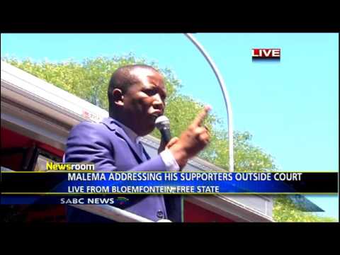 South African EFF leader Julius Malema addressing his supporters outside the Bloemfontein court
