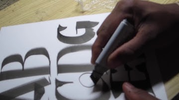 Dipping a Copic Wide Marker in Calligraphy Ink