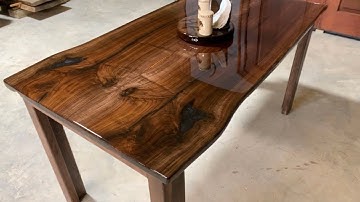 Stunning Black Walnut Dining Table with Epoxy top