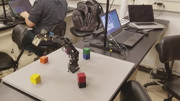 Color-ordered block stacking with robotic arm