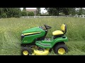 John Deere X350 mowing grass 4-5 feet tall, yes it can do it!