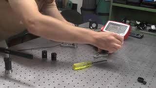 Aligning a Free Space Faraday Isolator