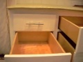 BluMotion softclose drawer slides, in action. BluMotion softclose drawer slides, in action.