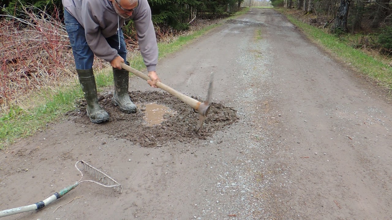 How Do You Fix A Pothole In A Gravel Driveway By Hand?