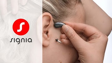 Pure Charge&Go IX - how to insert and remove a RIC hearing aid | Signia Hearing Aids