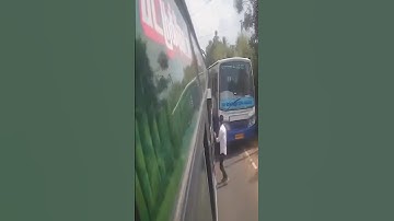 రెండు బస్సుల మధ్య ఇరుక్కుపోయి ప్రాణాలతో బైట పడ్డ వ్యక్తి two buses viral video