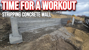 Stripping 2x12 Forms Off a Concrete Retaining Wall — Not as Easy as It Looks
