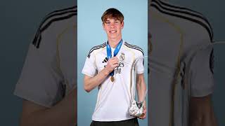 Real Madrid players celebrate with the trophy after winning the UEFA Youth League Final