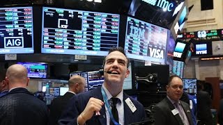 Dow Jones Industrial Average Tops 21,000 for First Time Dow Jones Industrial Average Tops 21,000 for First Time