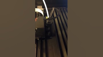 The 3D printer is making a toothpaste squeezer.