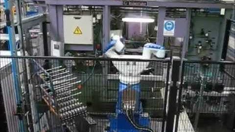 Motoman dual arm robot machine tending