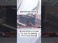 Two people climb to top of Empire State Building