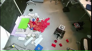 Autonomous Multi-Material Construction with Heterogeneous Robot Teams