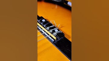 🎸 Tying Guitar Strings Like a Treble Clef?! Watch This! 🔥#GuitarHack #GuitarTips #ViralHack #foryou