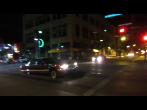 Lowrider cruising Route 66 downtown Albuquerque, New Mexico