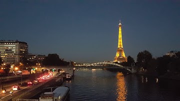 Eiffel tower! Paris at night background clip