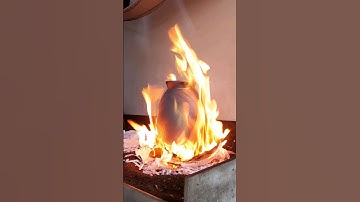 Dramatic flares, red hot embers and rainbows ; raku firing my large oval vase #vase #raku #art #fire