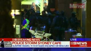 Sydney siege: First pictures of hostages shot dead by fanatic gunman as special forces storm cafe