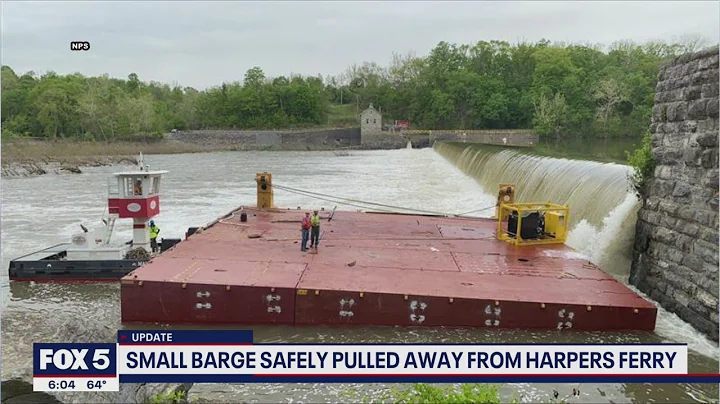 Runaway barge pulled to shore while another remain...