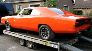 1969 Dodge Charger on transport.