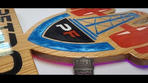 Petrofit Fitness project. CNC carving and Epoxy inlay.