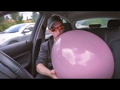 Blowing up and bursting a big pink balloon