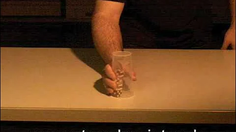 Dice Stacking - super-slowmotion with clear cup - 500fps