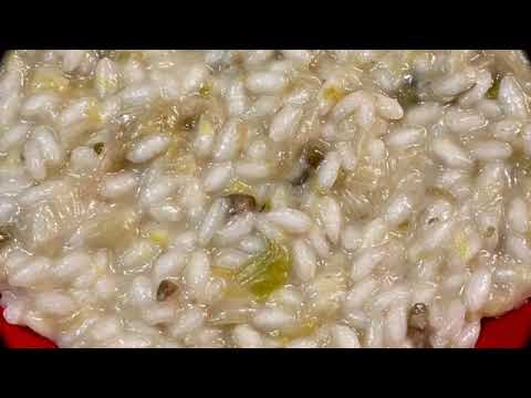 RISOTTO CON SCAROLA ED ACCIUGHE piatto morbido e saporito con ingredienti genuini e semplici.