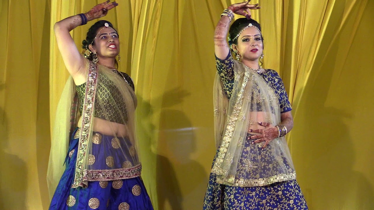 Bride and her sister dance in marriage