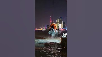 Nighttime Dredging Operations by Grab Dredger