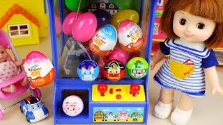 poli surprise eggs crane machine and baby doll, kinder joy toys