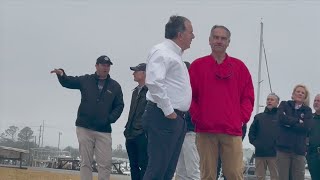 Senator Rick Scott surveys tornado damage with other officials