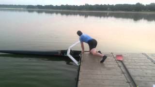 Getting in a scull from a high dock