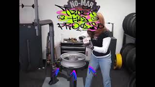 Girl Changing a Tire using a NoMar Tire Changer
