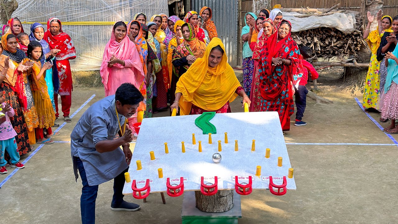 বল ব্যালান্সের আজব খেলায় পুরস্কারের ছড়াছড়ি। সবাই চাল, ডাল, তেল, চিনির সাথে জিতে নিলো শীতের চাঁদর