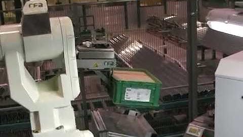 Kawasaki robot handling and loading crates