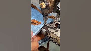 chặn đáy vào nẹp kéo miệng chiếc túi xách siêu to và đẹp