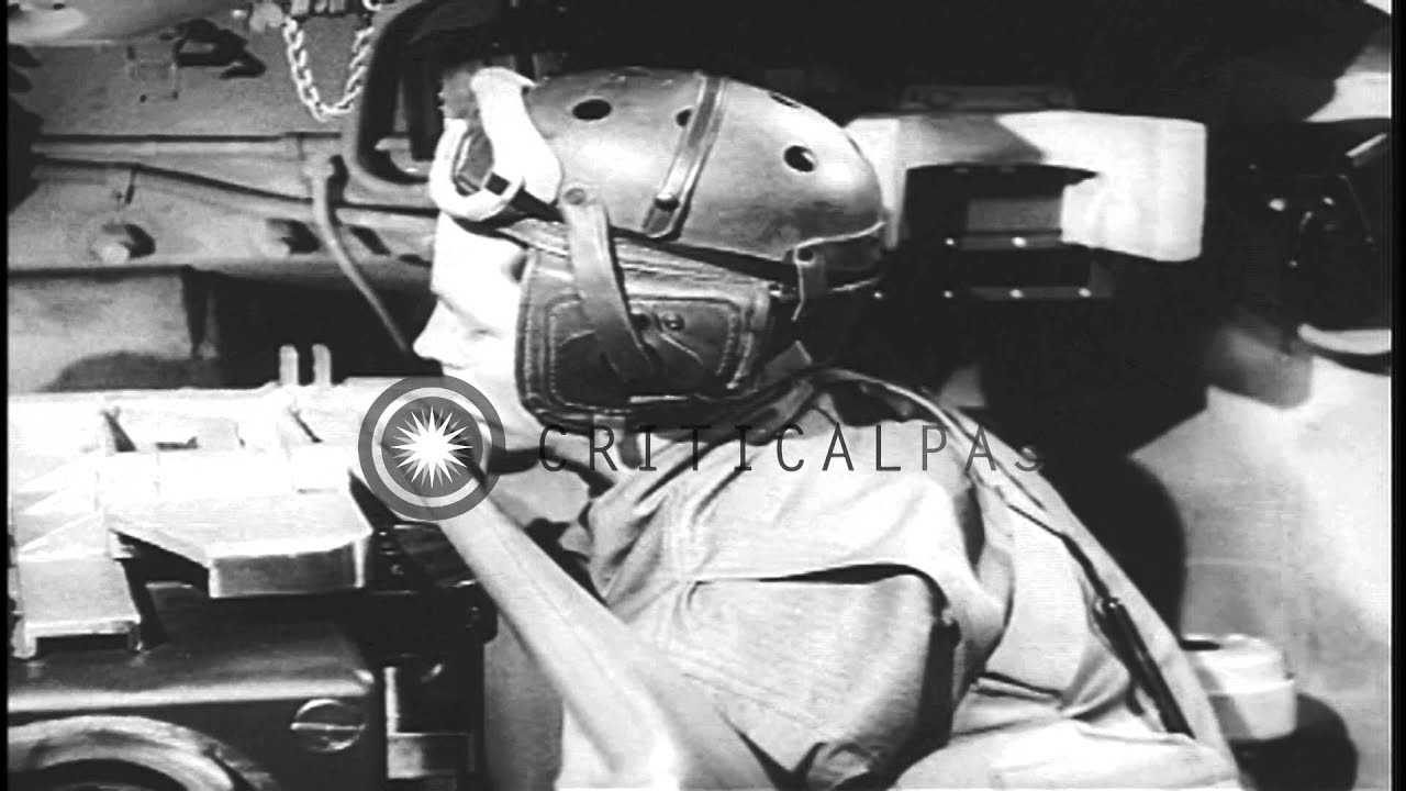 While Seated Inside An M4 Tank A Gunner Operates Instruments Of The Tank In The Hd Stock Footage