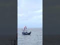 The fishermen are going to catch fish in the river.#fishboat