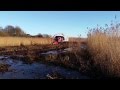 PistenBully harvesting reed beds - Minsmere