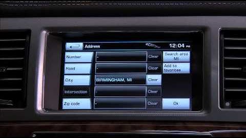 How to operate the navigation in the 2012 Jaguar XF