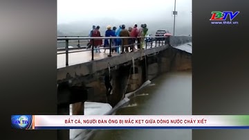 Bắt cá, người đàn ông bị mắc kẹt giữa dòng nước chảy xiết