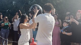 Creative parents-to-be joke around with guests before baby's gender reveal || WooGlobe