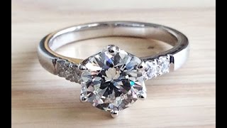 GIA certified 1.23 carat, I-color, VVS2-clarity, Triple Excellent Solitaire with Side Diamonds Ring