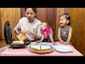 Bela  jaila xtrmely grateful  happy see mom grill bread in toaster